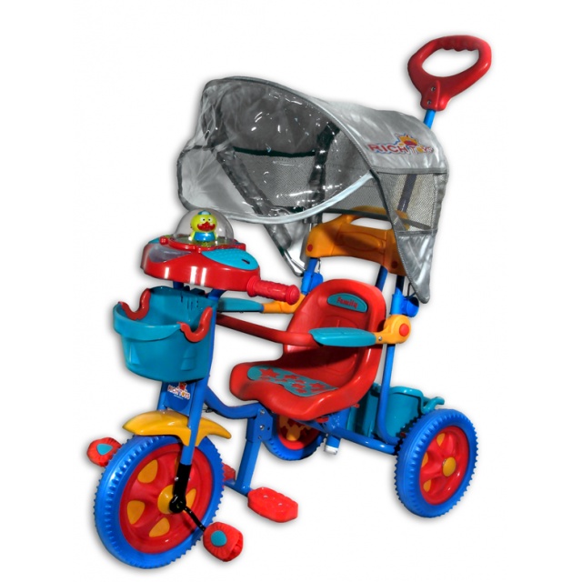 Трехколесный велосипед с игрушкой-утенком, зонтом и памперсом.